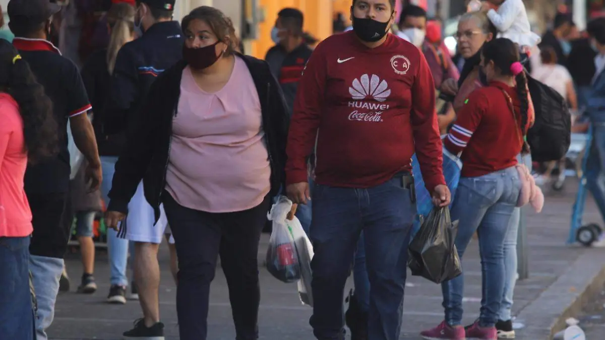 Población haciendo compras en tiempos de Covid-19